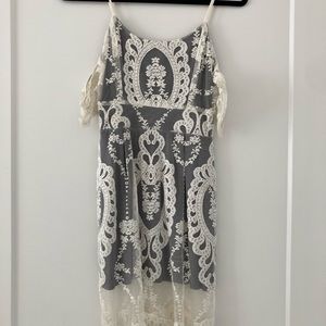 White lace dress with cute arm cuffs